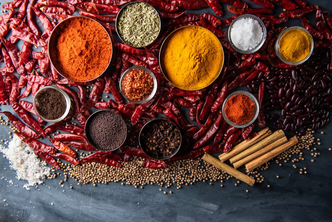 variety-of-spices-and-herbs-on-kitchen-table-2024-10-16-14-03-30-utc